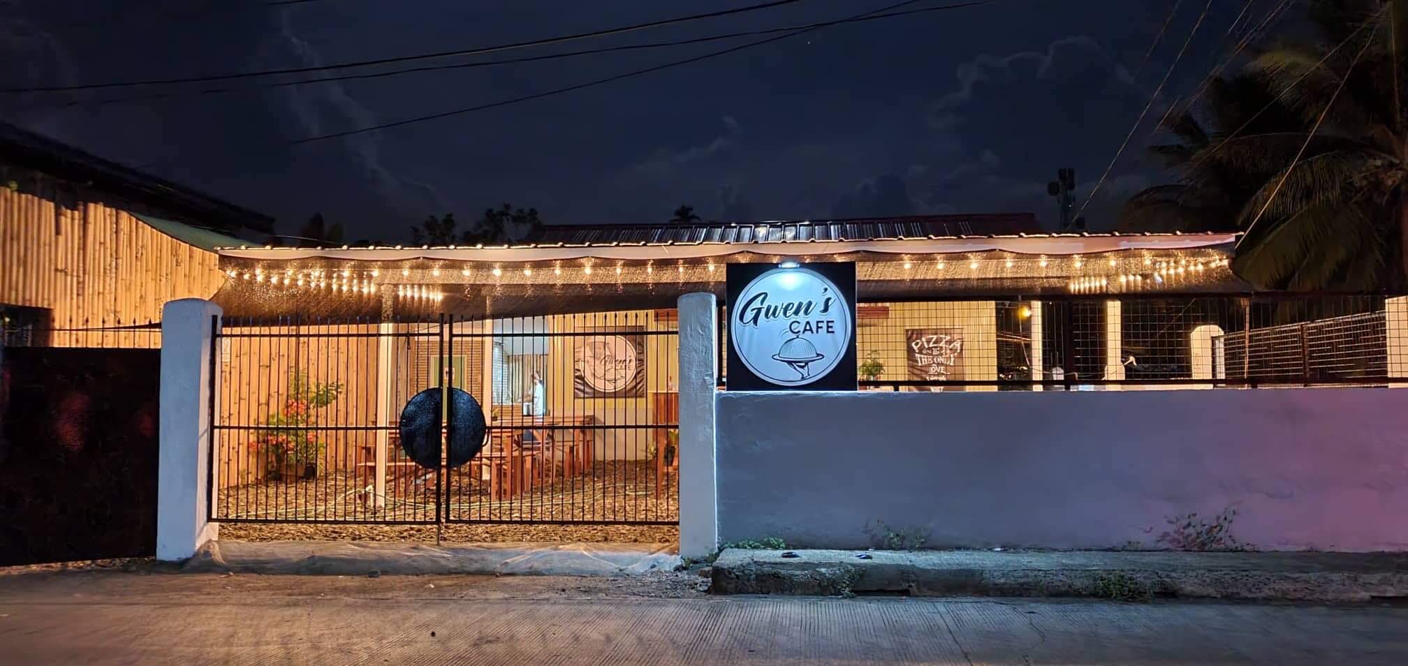 <b class="font-bara"><i class="bi bi-geo-fill h4"></i> GWEN'S CAFÈ</b> <br/>Located at Brgy. Purisima